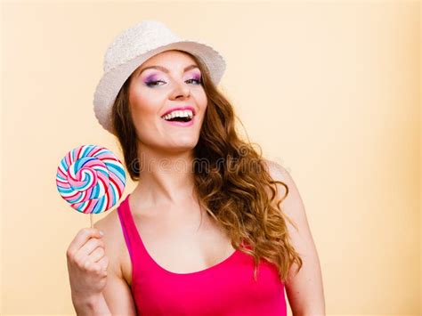 Woman Holds Colorful Lollipop Candy In Hand Stock Photo Image Of