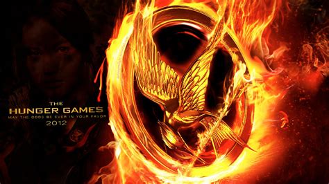 The backstory, and the setting; 'The Hunger Games' Movie Poster Wallpapers - The Hunger ...