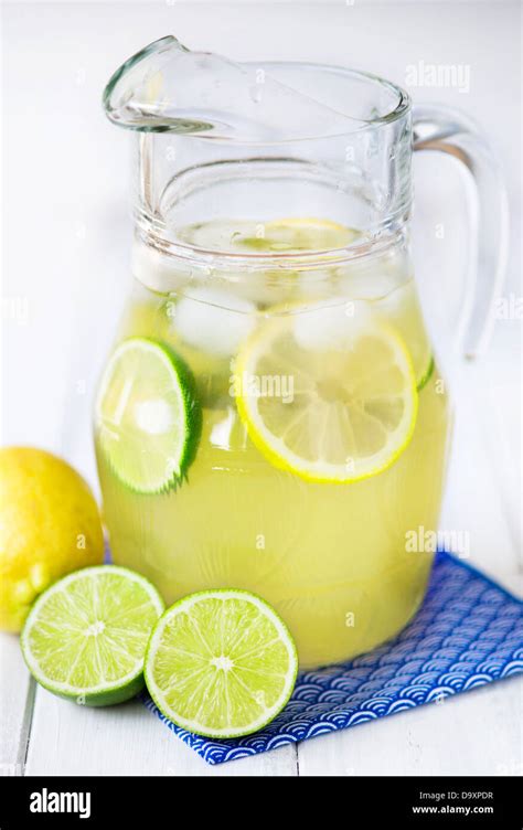 Pitcher Full Of Lemon And Lime Lemonade With Ice Stock Photo Alamy