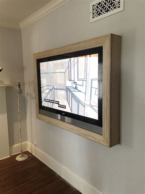 Adjust the tv tilt and its swing arm, grab the remote and some refreshments, and then kick back and admire the new diy tv room. Five Steps to Build a Frame for a Wall Mounted TV ...