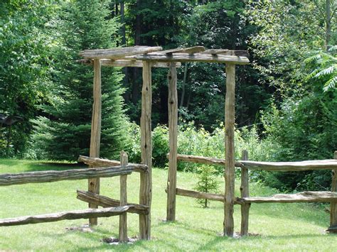 Wrought iron gates, wood, security, split rail, vinyl, dog, electric fence ideas. Image result for split rail cedar arbor | Cedar split rail ...