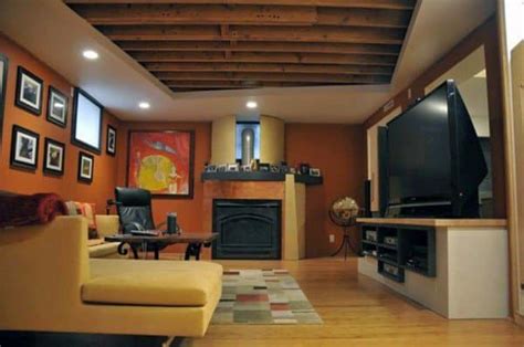 Others are covered with a drop ceiling system of rails and panels that makes it much easier to access overhead pipes, wiring. Top 60 Best Basement Ceiling Ideas - Downstairs Finishing ...