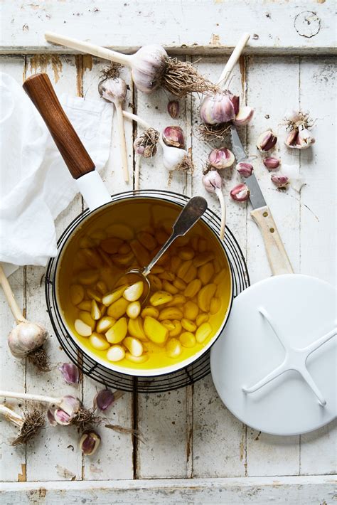 Easy Garlic Confit Olive And Mango Recipe Food Food Is Fuel Recipes