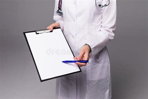 Close Up Of Nurse With Clipboard And Pen With Girl Stock Photo Image