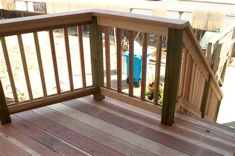 This simple diy deck idea is 3.5″ below this and consists of vertical 2x4s between 2×4 top and bottom plates. deck railing | Deck railing design, Balcony railing design ...