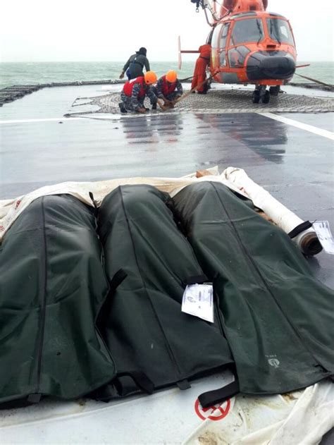 Airasia Qz8501 First Bodies Returned To Airport Bad Weather Hampers Recovery Of Wreckage