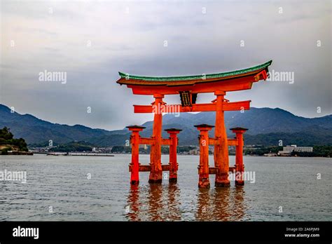 The Floating Torii Gate Of Itsukushima Shrine In The Sea Off Miyajima Island Japan Stock Photo