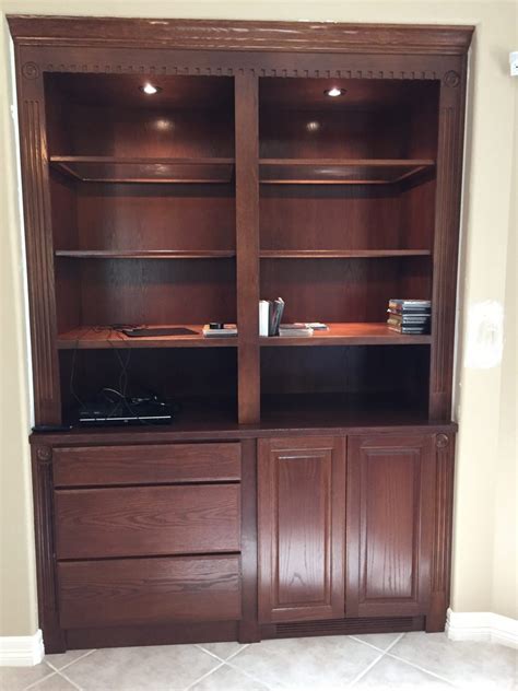 Large wardrobe with racks and shoe shelves, drawers and a small mirror. Jaimes Custom Cabinets | custom built in cabinet that ...