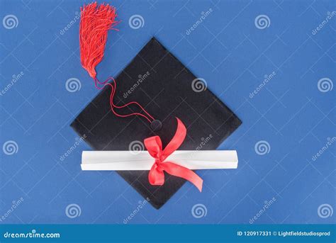 Graduation Hat And Diploma With Red Ribbon Stock Image Image Of High