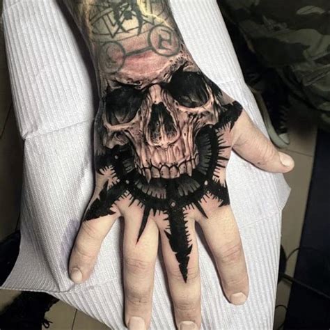 Top 98 About Skull Hand Tattoo Designs Super Cool Indaotaonec