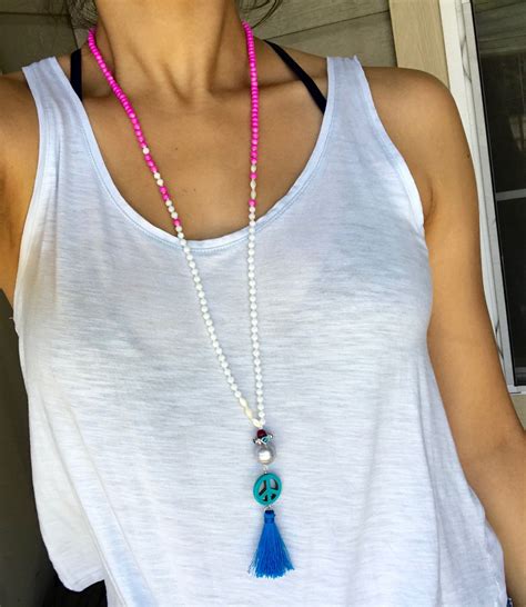 PEACE Beaded Tassel Necklace neon blue tassel hot pink | Tassel necklace, Beaded tassel necklace ...