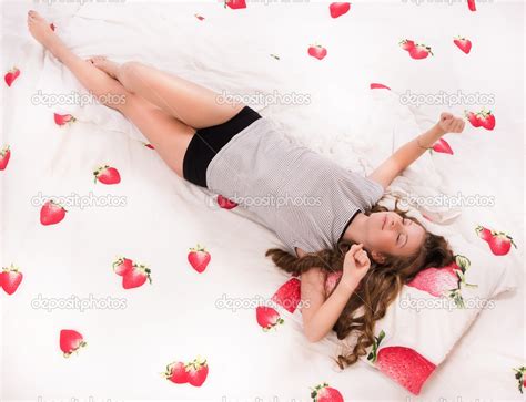 Pretty Girl Lying On The Bed Stock Photo By Demian