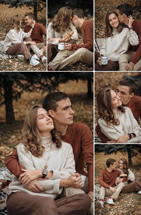 A Man And Woman Sitting On The Ground With Their Arms Around Each Other