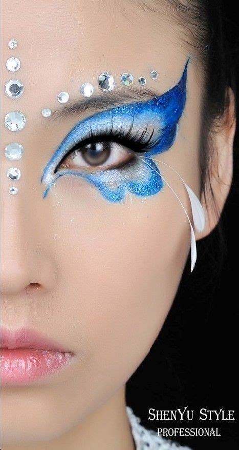 Butterfly Face Paint With Feather And Gem Accents 468515167484141225
