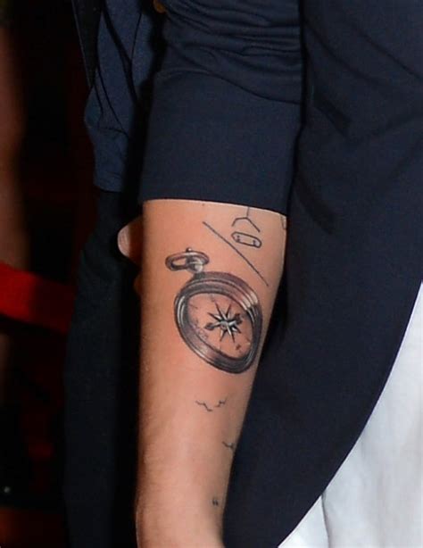 Louis tomlinson, 24 years old in two days! Zayn's Lucky Tattoo