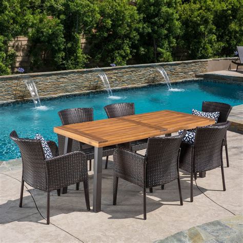 Find your favorite outdoor wicker dining table today with the help of our friendly customer service team. Delgado 7 Piece Outdoor Dining Set with Wood Table and ...