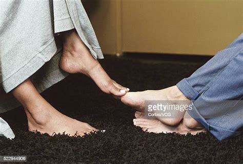 Playing Footsie Photos Et Images De Collection Getty Images