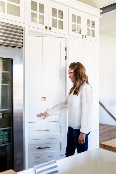 I am curious what holds them in place… is it just balanced in place? pantry is hidden with a faux cabinet front door. | Hidden ...