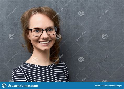 Portrait Of Happy Girl With Eyeglasses Smiling Broadly Stock Image