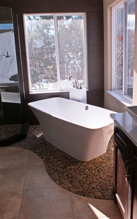 Organic Modern Bath With Freestanding Tub And Pebble Tile Bathroom