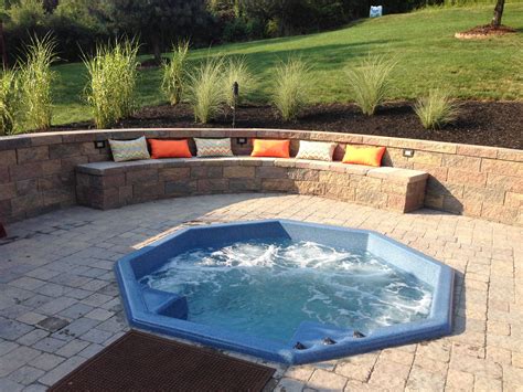 Backyard Entertaining Area Sunken Hot Tub Jacuzzi With Built In Seating And Retaining Wall