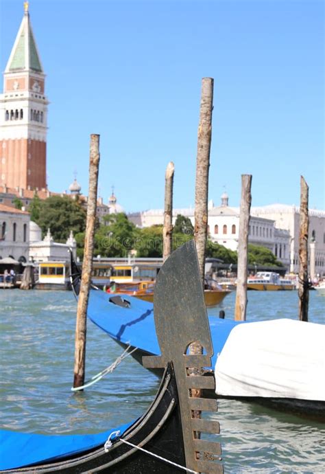 Gondola With The Bell Tower Of The Saint Marco Behind Venice Stock