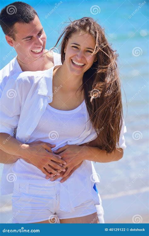 Happy Couple Have Fun On The Beach Stock Photo Image Of Holiday