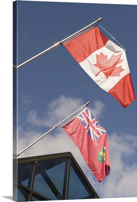 The flag of ontario was derived from the canadian red ensign. Canadian flag and Ontario flag, Muskoka, Ontario, Canada ...