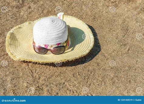 women`s hat and sunglasses on the sandy beach stock image image of still shore 124144519