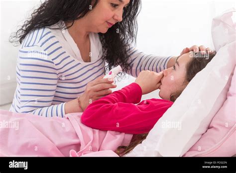 Mother Taking Care Of Her Sick Babe Stock Photo Alamy