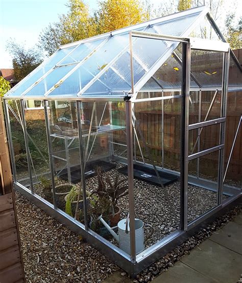 An 8ft X 6ft Plastic Base Under A Greenhouse Stores Greenhouse