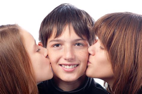 Two Pretty Girls Kissing Smiling Boy Stock Photo Image