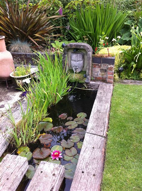 This Unusual Water Feature Using Reclaimed Railway Sleepers Has Been