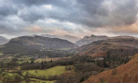 Stunning Winter Sunrise Landscape View From Loughrigg Fell Towards