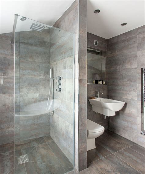 Forget boring usual tiles, today's design industry offer a wide range of gorgeous bold and patterned tiles to cover your walls, shower area and floor. Bathroom Grey Tile Ideas | Tile Design Ideas