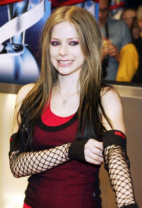 Almost time for my new music, are you ready? AVRIL LAVIGNE at Juno Awards in Edmonton 04/05/2004 ...