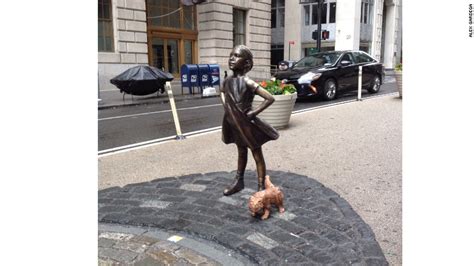Fearless Girl Joined Briefly By Peeing Pug Statue