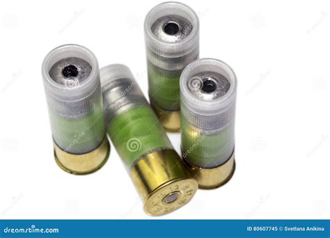 Four 12 Gauge Hunting Shotgun Bullet Cartridges Isolated Stock Image