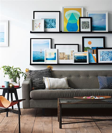 The kind of pictures you choose can say a lot about your favorite colors the shade of wall paint you use can make your wall pictures pop, or get them blending in with the paint. Create the Easiest-Ever Gallery Wall | Real Simple