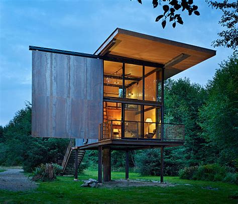 The small home sits on two sleds, making relocating it with a tractor a cinch (byo tractor). Low-Maintenance Prefab Tiny Steel Country Cabin | iDesignArch | Interior Design, Architecture ...