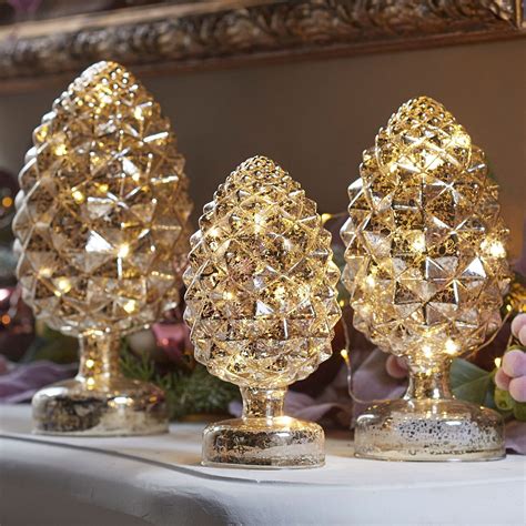 Whether you have a traditional home or prefer a more contemporary christmas look in your living room, kitchen, dining room, and entry, our holiday decorating ideas will inspire you. Pre-Lit Mercury Glass Pinecones, Set of 3 | Mercury glass ...