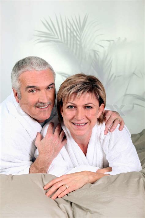 mature couple in bathrobes stock image colourbox