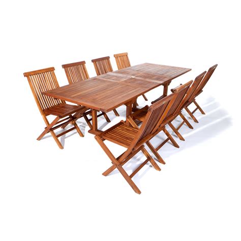 Calhoun dining side chairs in natural teak. Java Teak 9-Piece Extension Table and Folding Chair Set