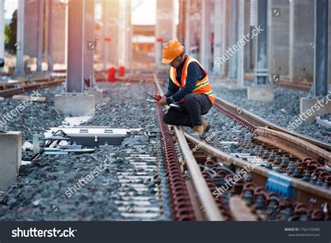 Stock Photo Engineer Sitting On Railway Inspection Construction Worker