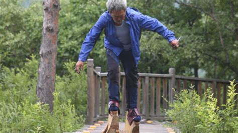 A 70 Year Old Man Climbs Mountain Wearing Self Made Wooden Shoes Youtube