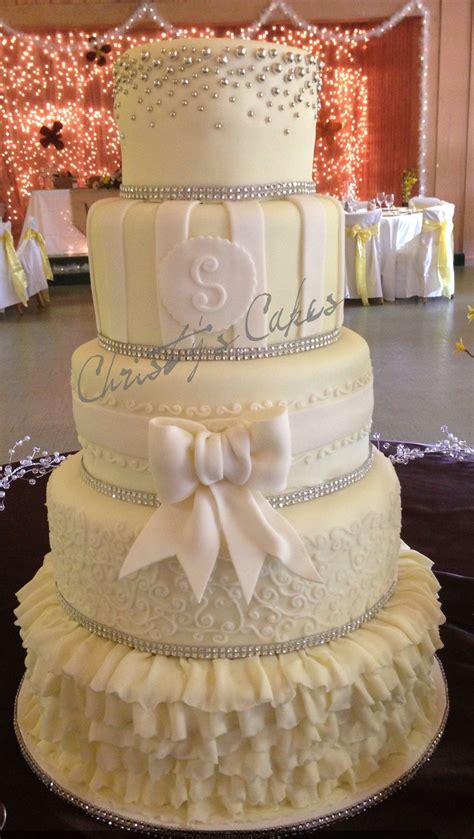 Elegant Ivory Ruffles Wedding Cake Wedding Cake Table