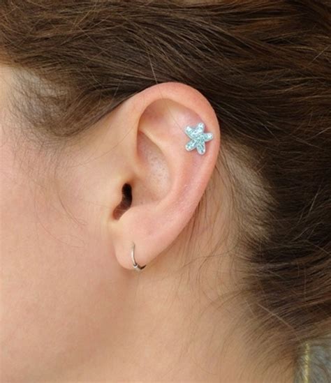 These stunning pieces dangle from the side of the ear, shielding a large portion of your cartilage. 90 Helix Piercing Ideas for Your Trendiest Self