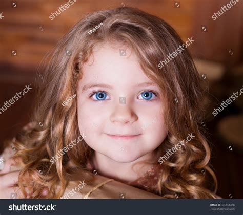 Beautiful Little Curly Blonde Girl Has Stock Photo 345161450 Shutterstock