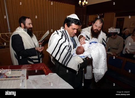 A Brit Milah Ceremony Takes Place On The Bimah Of The Synagogue In The