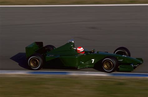 Very Rare Hq Photo Of Eddie Irvine Driving A Jaguar R1 With A Testing